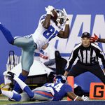 Dez Bryant hauls in a touchdown pass in the 1st quarter.